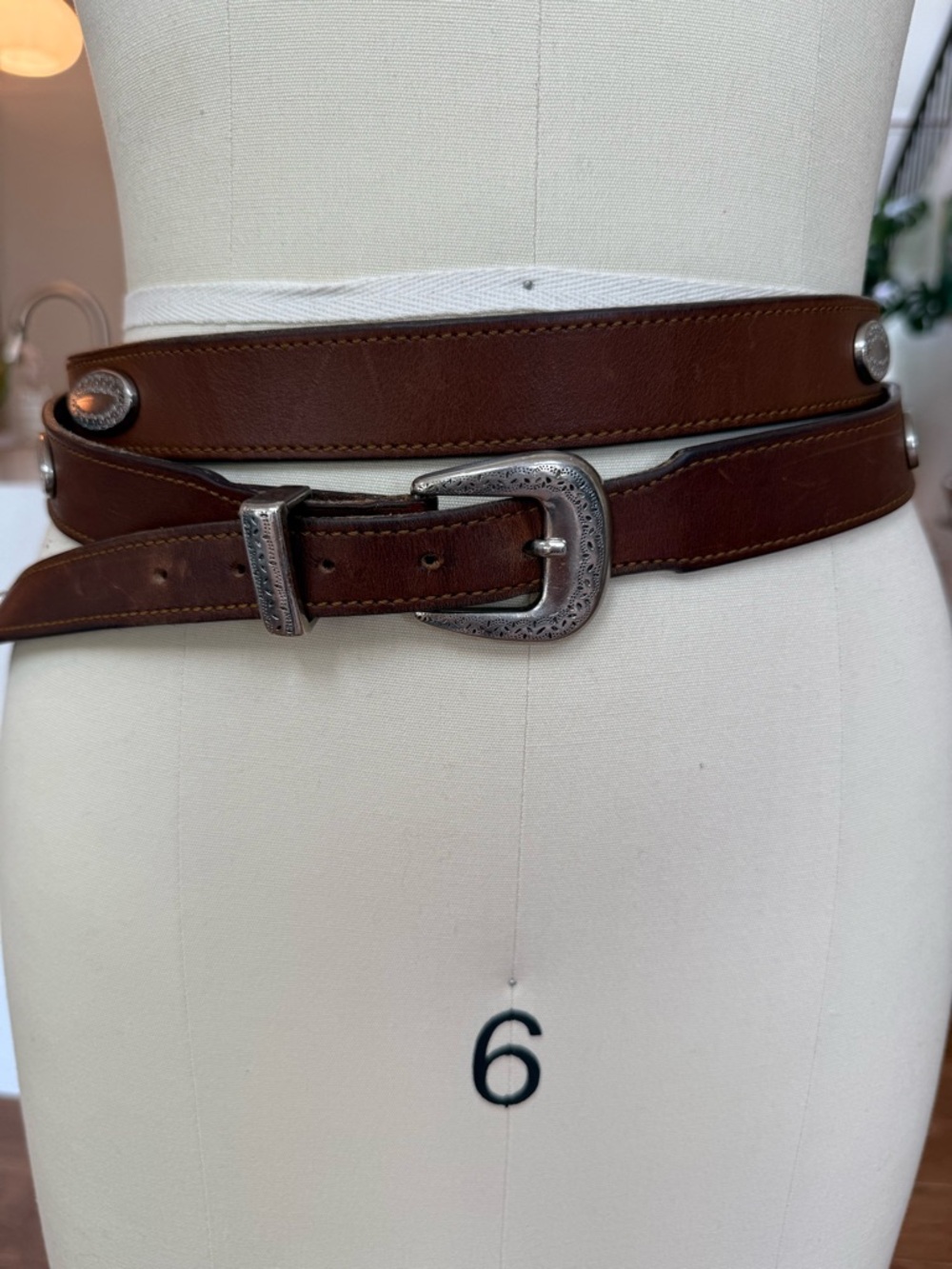 Vintage double wrap Brown western leather belt with silver buckle.